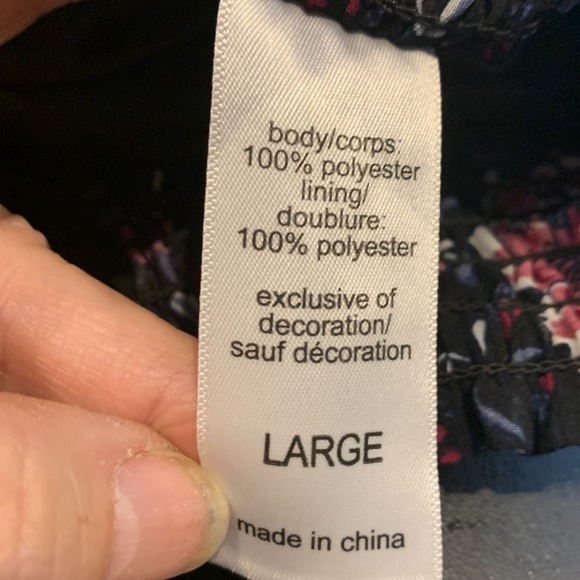 Maurices black and purple flowered shorts size Lg. 100% polyester. Pockets - Picture 5 of 6